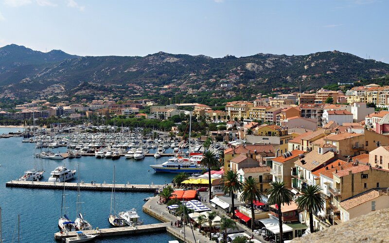 harbor town with mountains