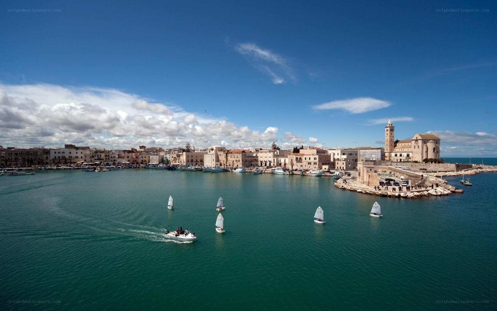 harbor town with sailboats