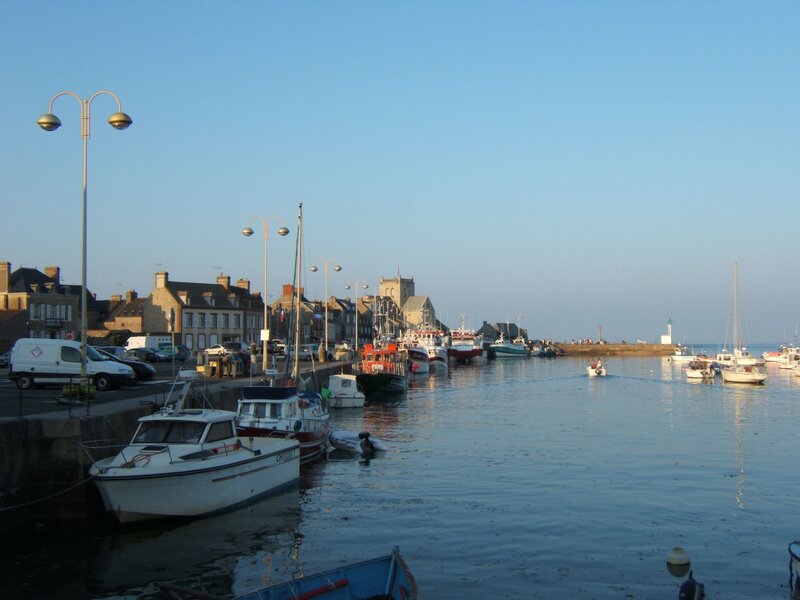 harbor with boats and church