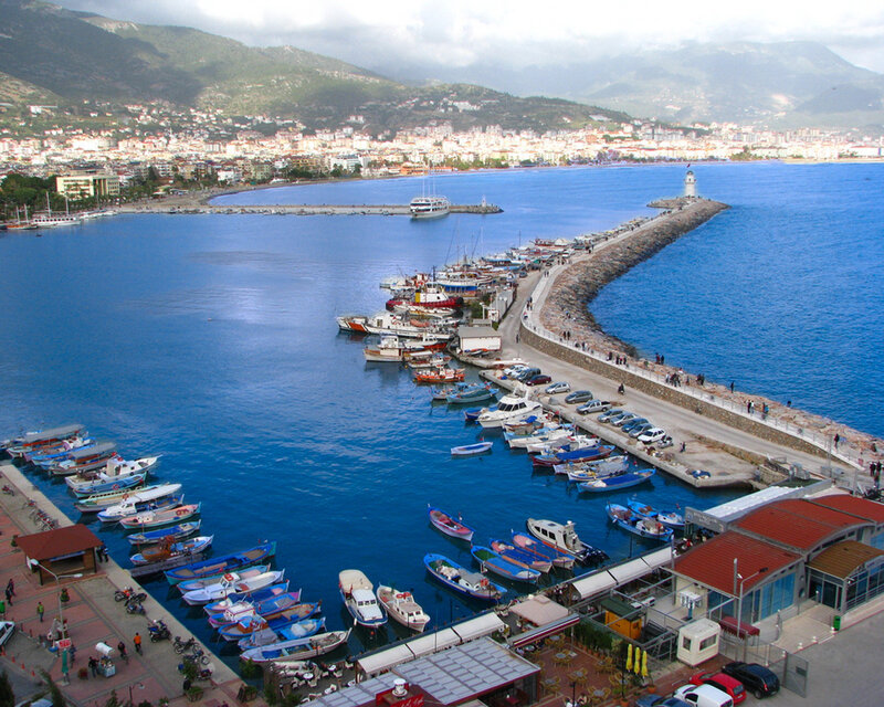 Harbor with boats and city
