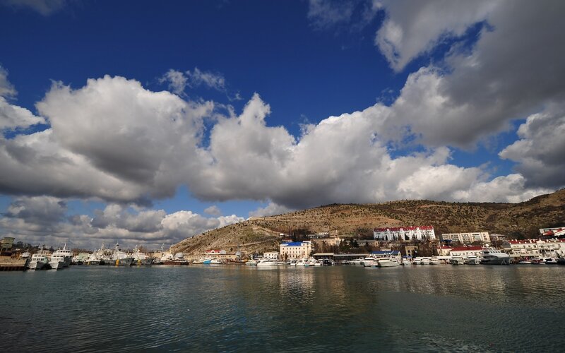 Harbor with Boats and Hill
