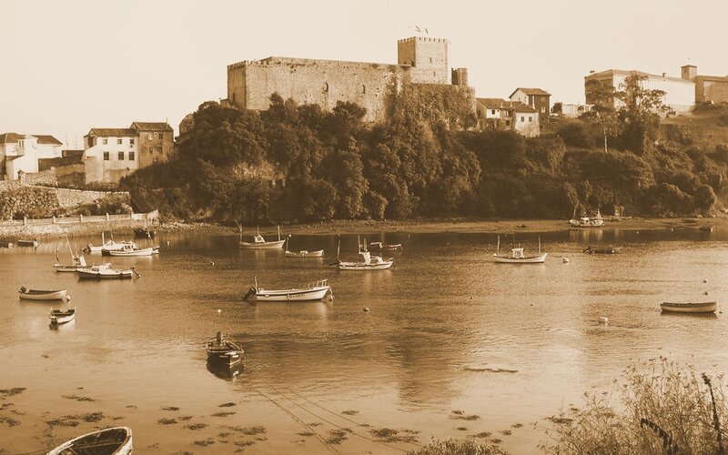harbor with castle in background
