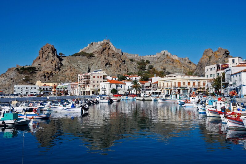 harbor with castle on hill