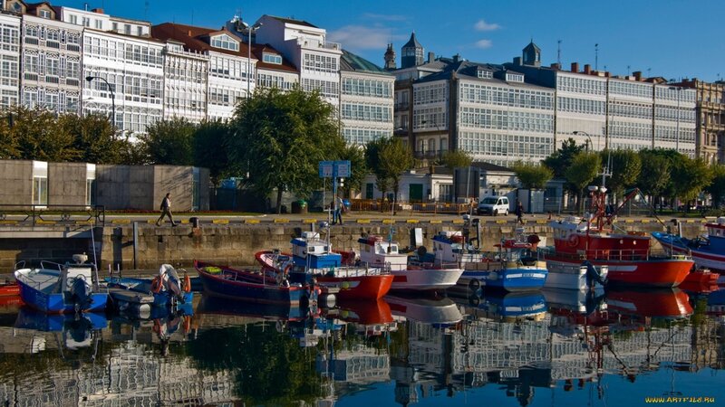 harbor with colorful boats and buildings