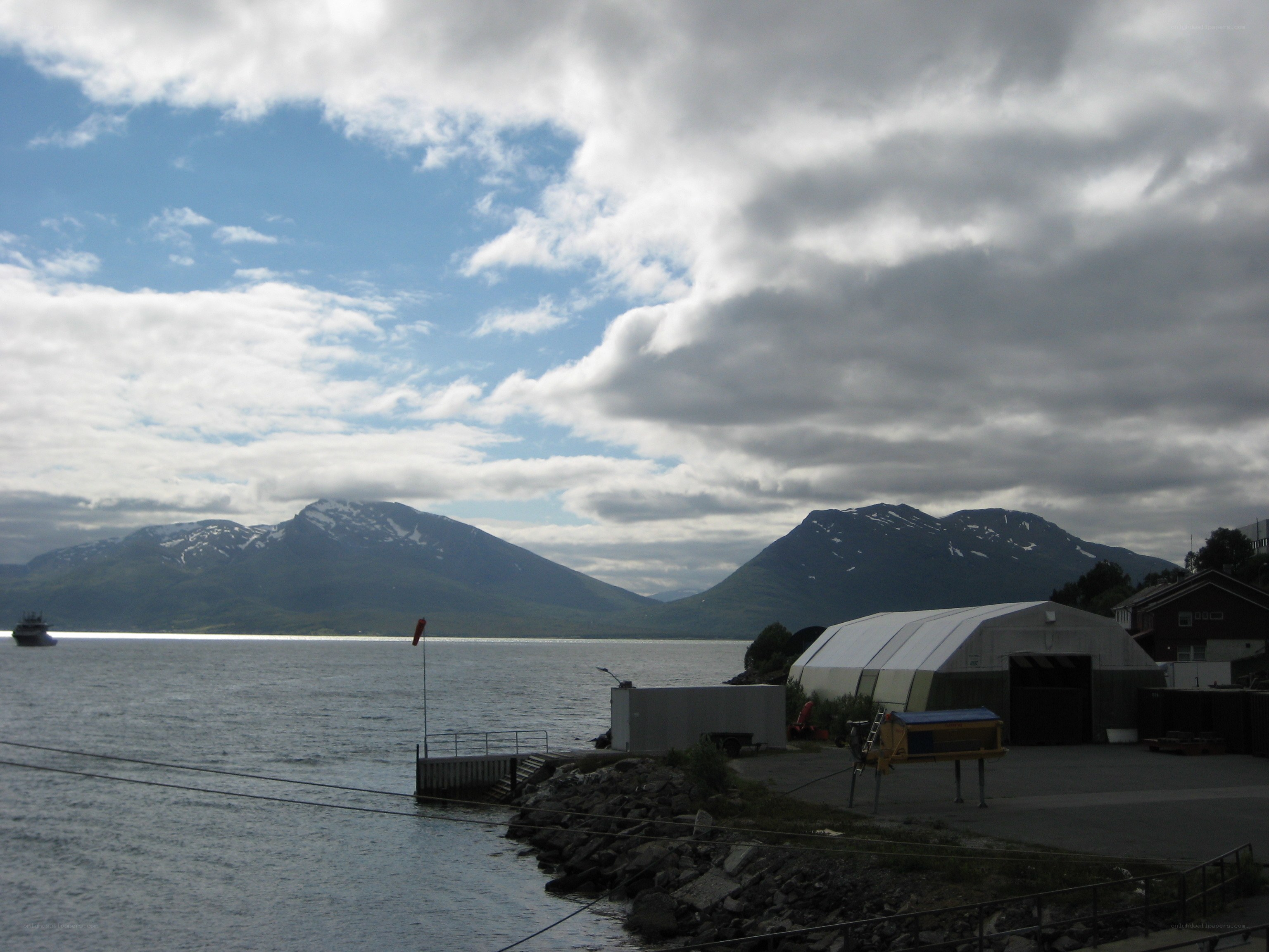 Harbor with mountains in background
