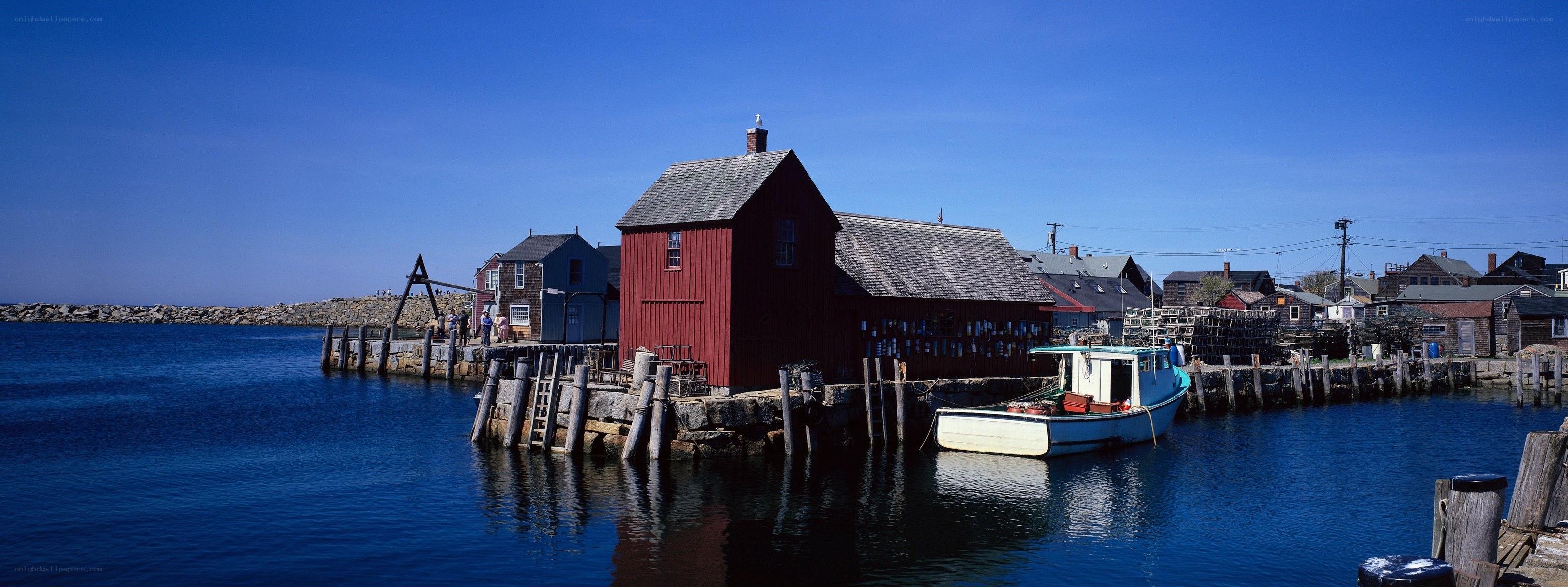 Harbor with red building and boats
