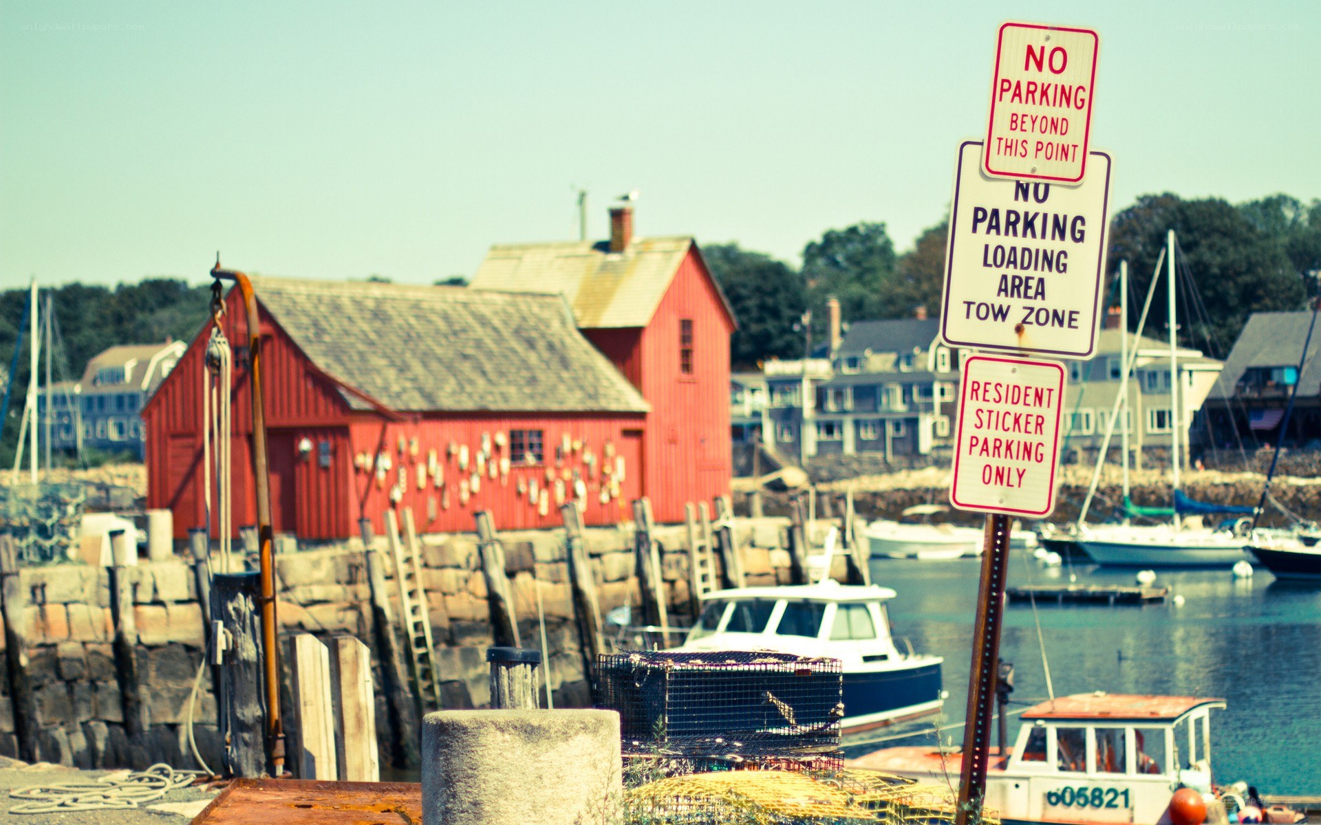 Harbor with red building and signs