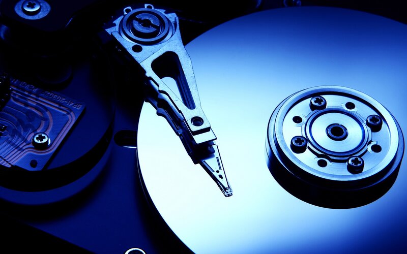 Hard Drive Internals — Blue, Dramatic, Photograph, Disk Platter, Read/write Head, Circuit Board, Black