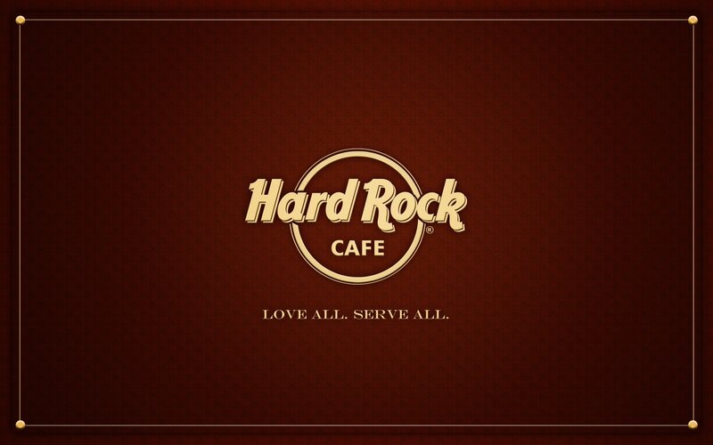 Hard Rock Cafe logo on brown background