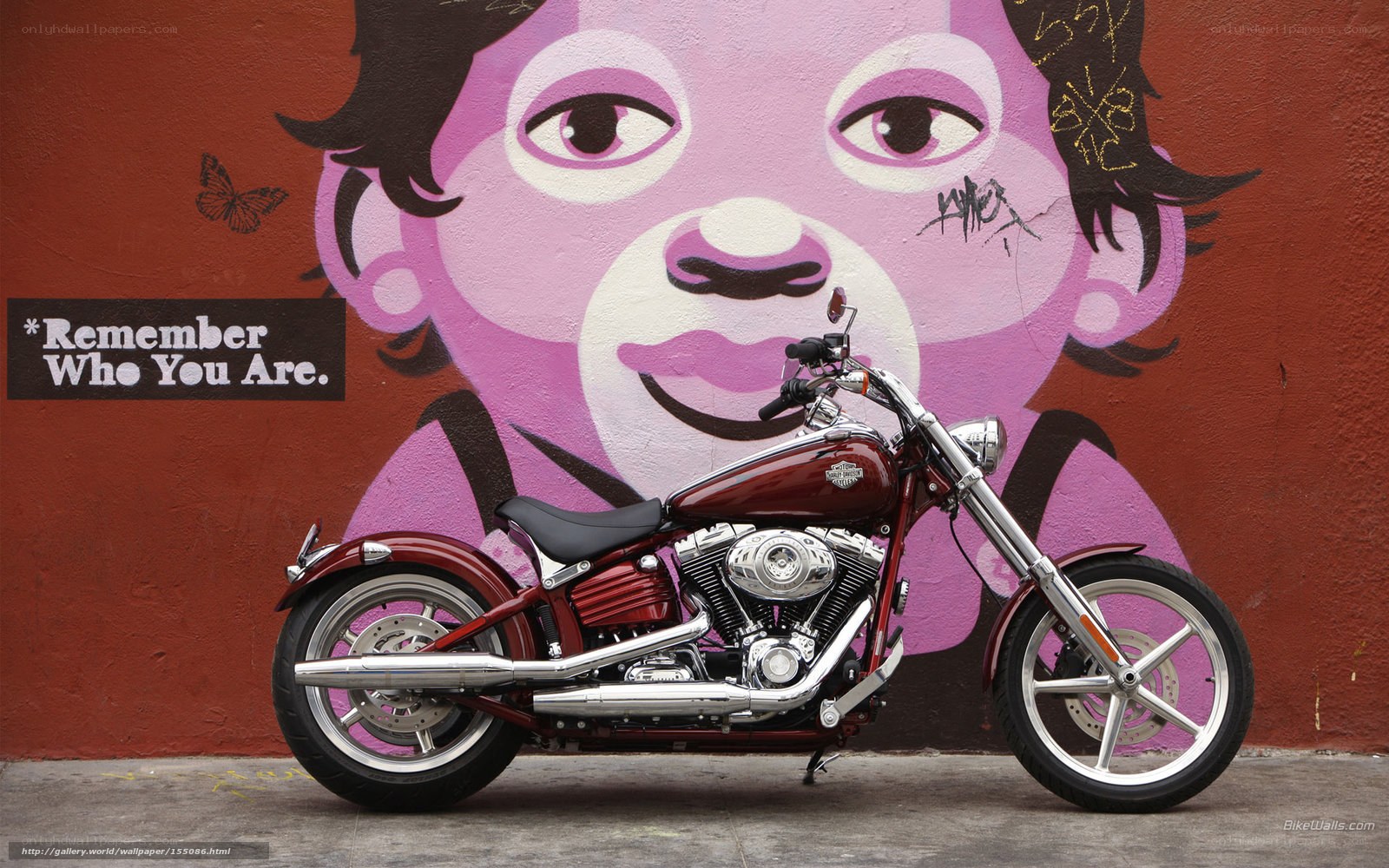 Harley-Davidson in front of mural