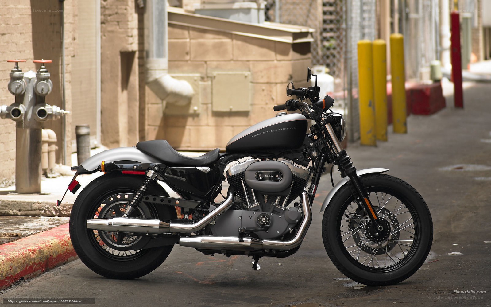 Harley-Davidson motorcycle in alley