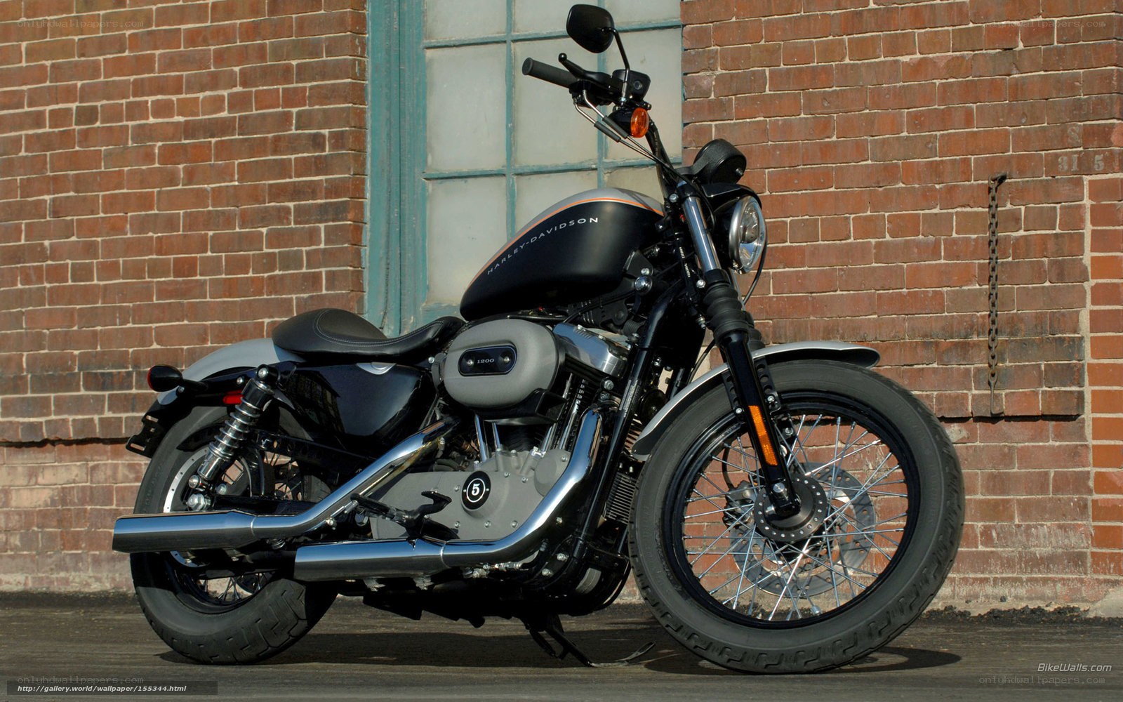 Harley-Davidson motorcycle on brick wall