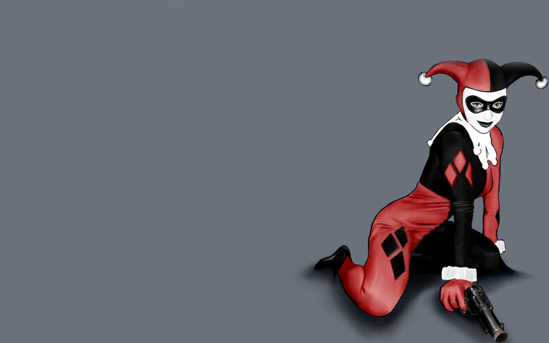 Harley Quinn kneeling with gun
