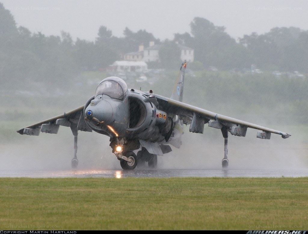Harrier jet landing in rain
