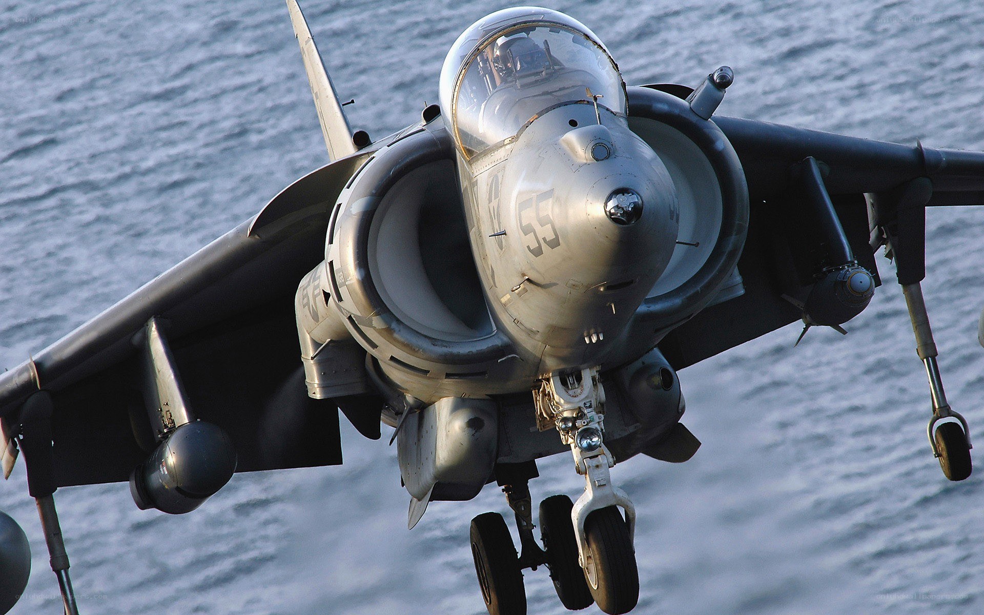 Harrier jet landing on ship