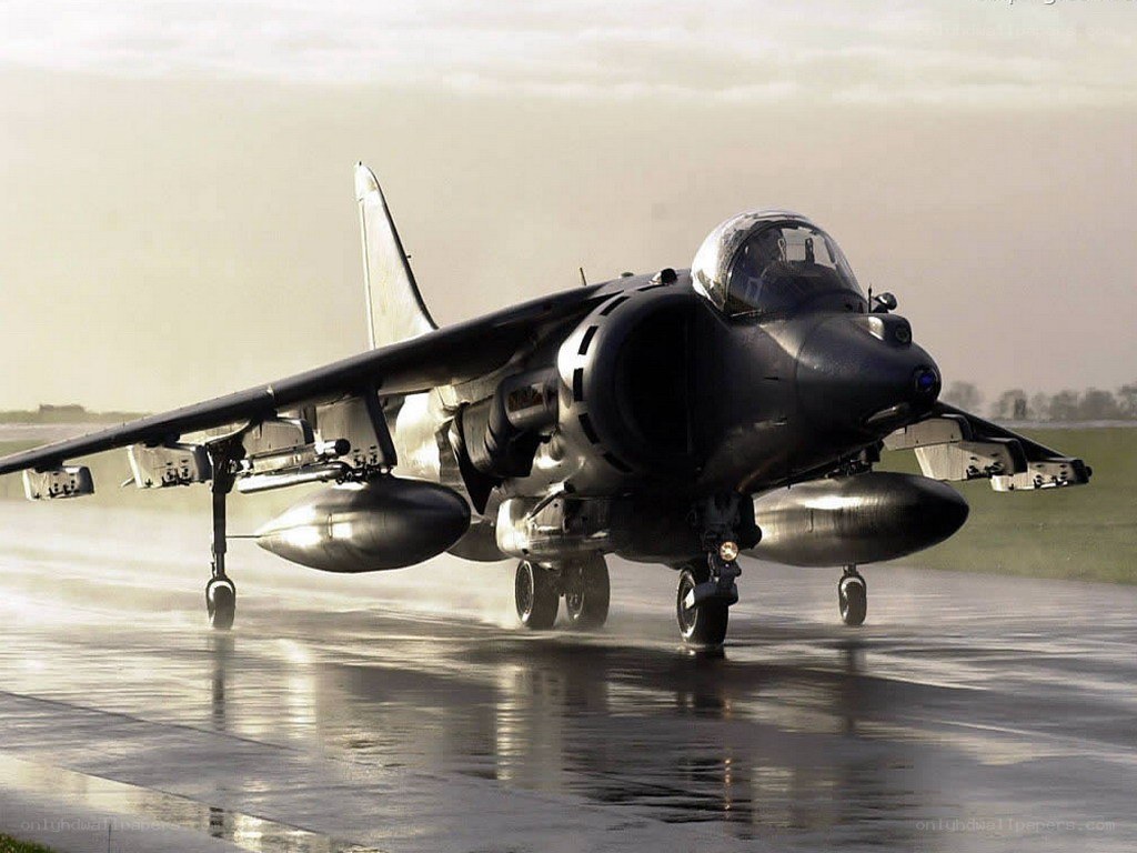 Harrier jet on wet runway
