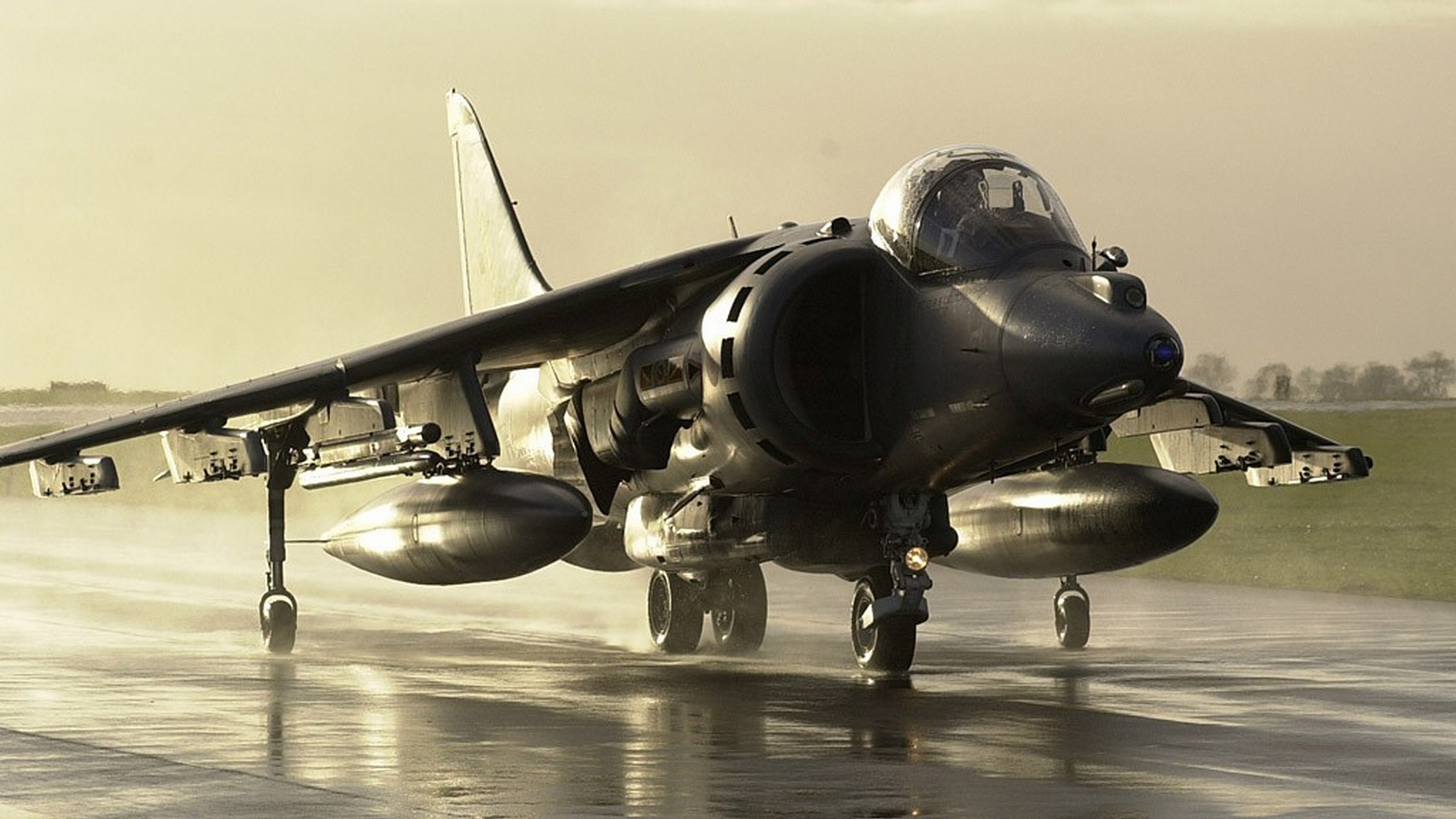 Harrier jet on wet runway