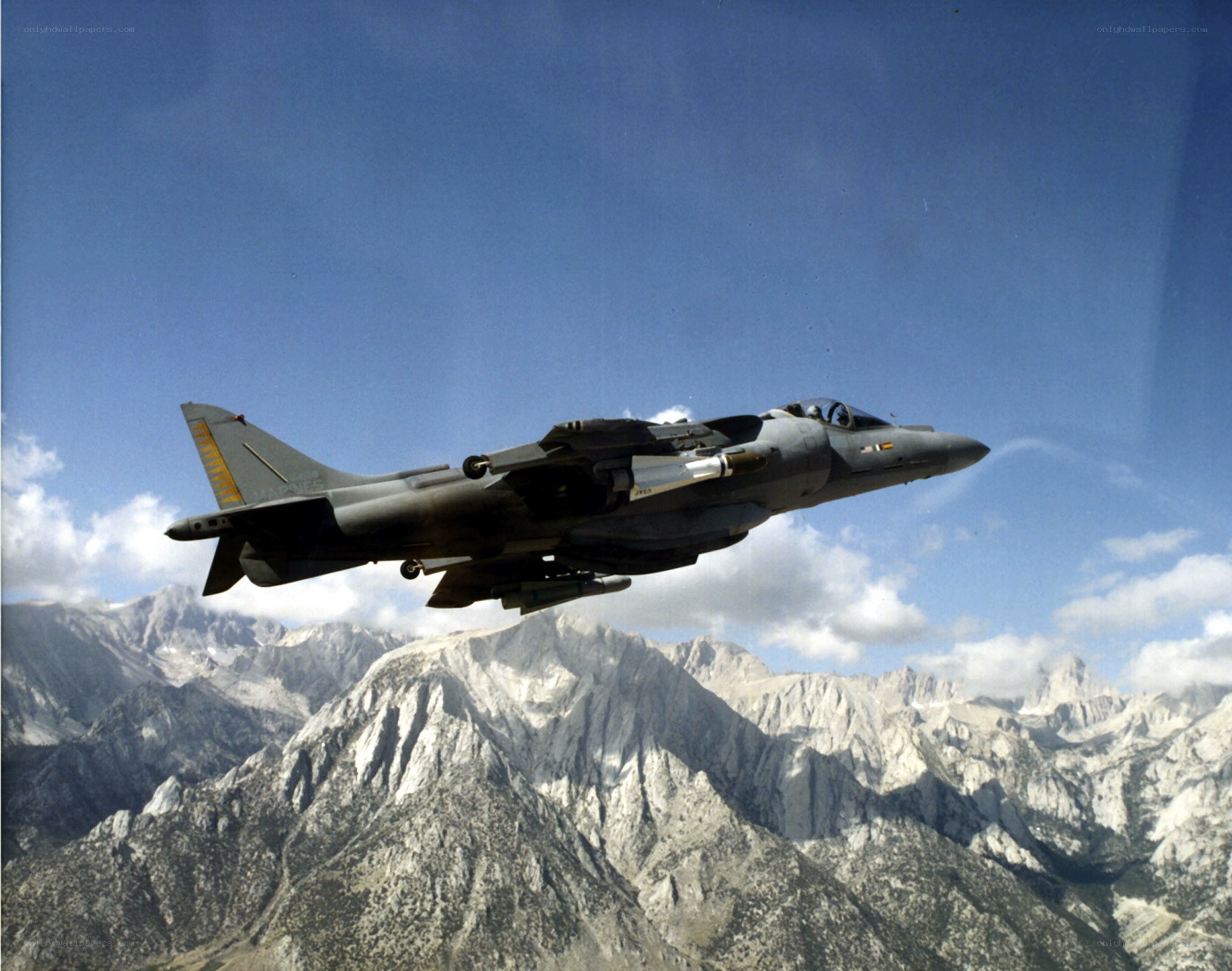 Harrier jet over mountains