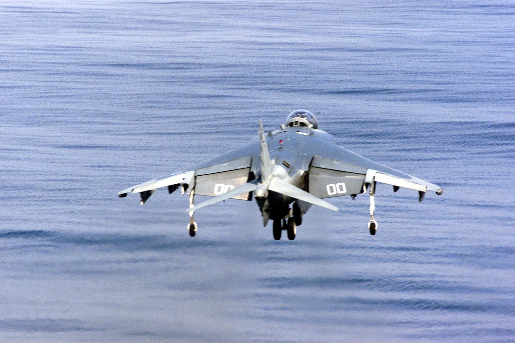 Harrier jet over ocean