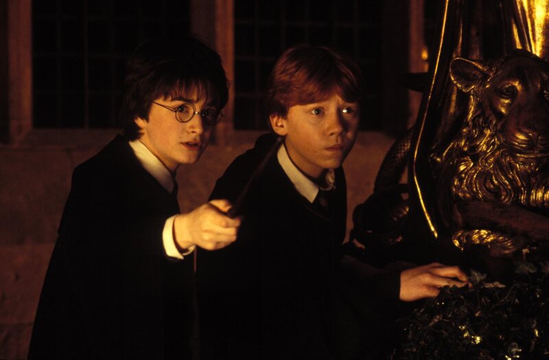 Harry and Ron with wands