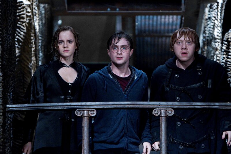 Harry Potter and friends in a dark corridor