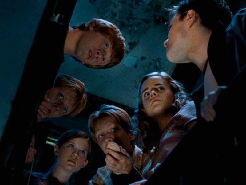 Harry Potter and friends in a dark room