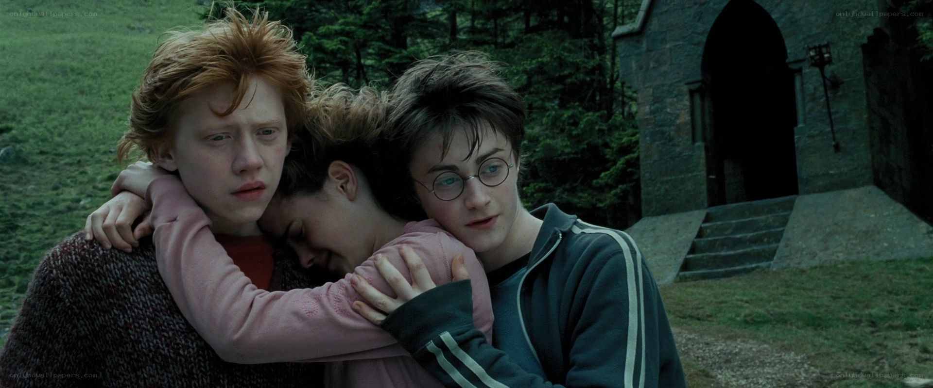 Harry Potter hugging friends