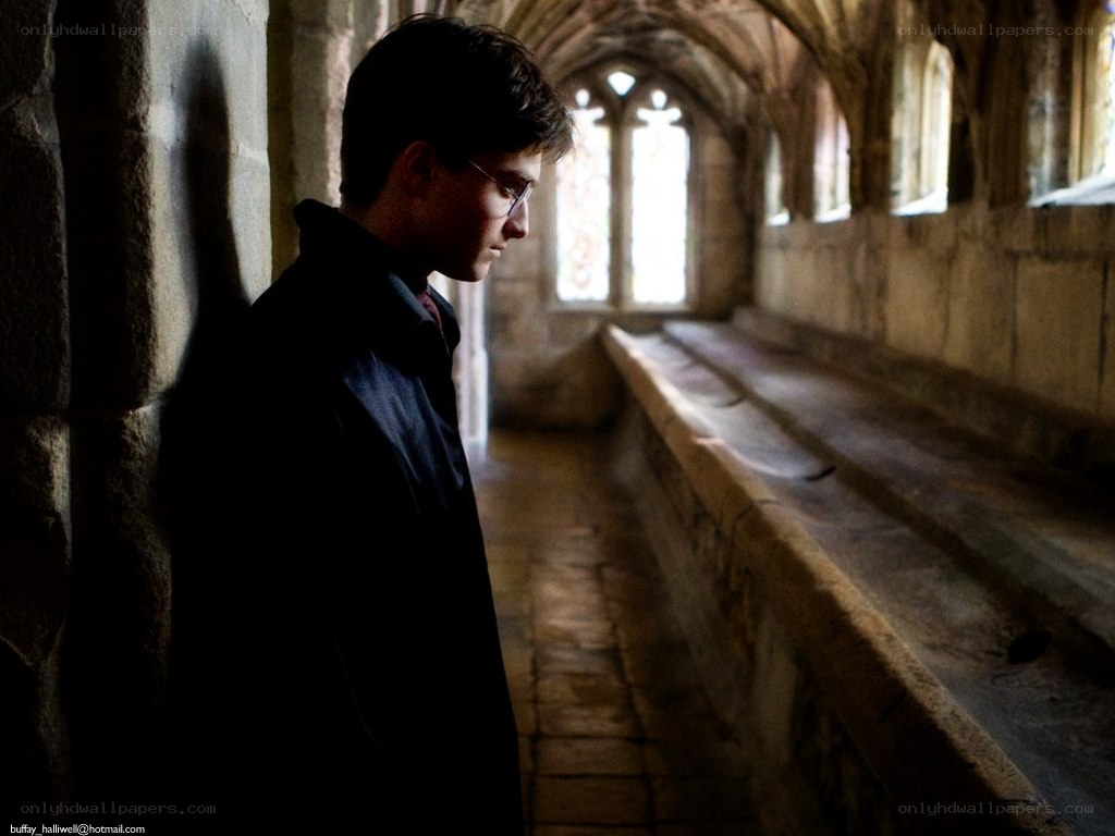 Harry Potter in a stone corridor