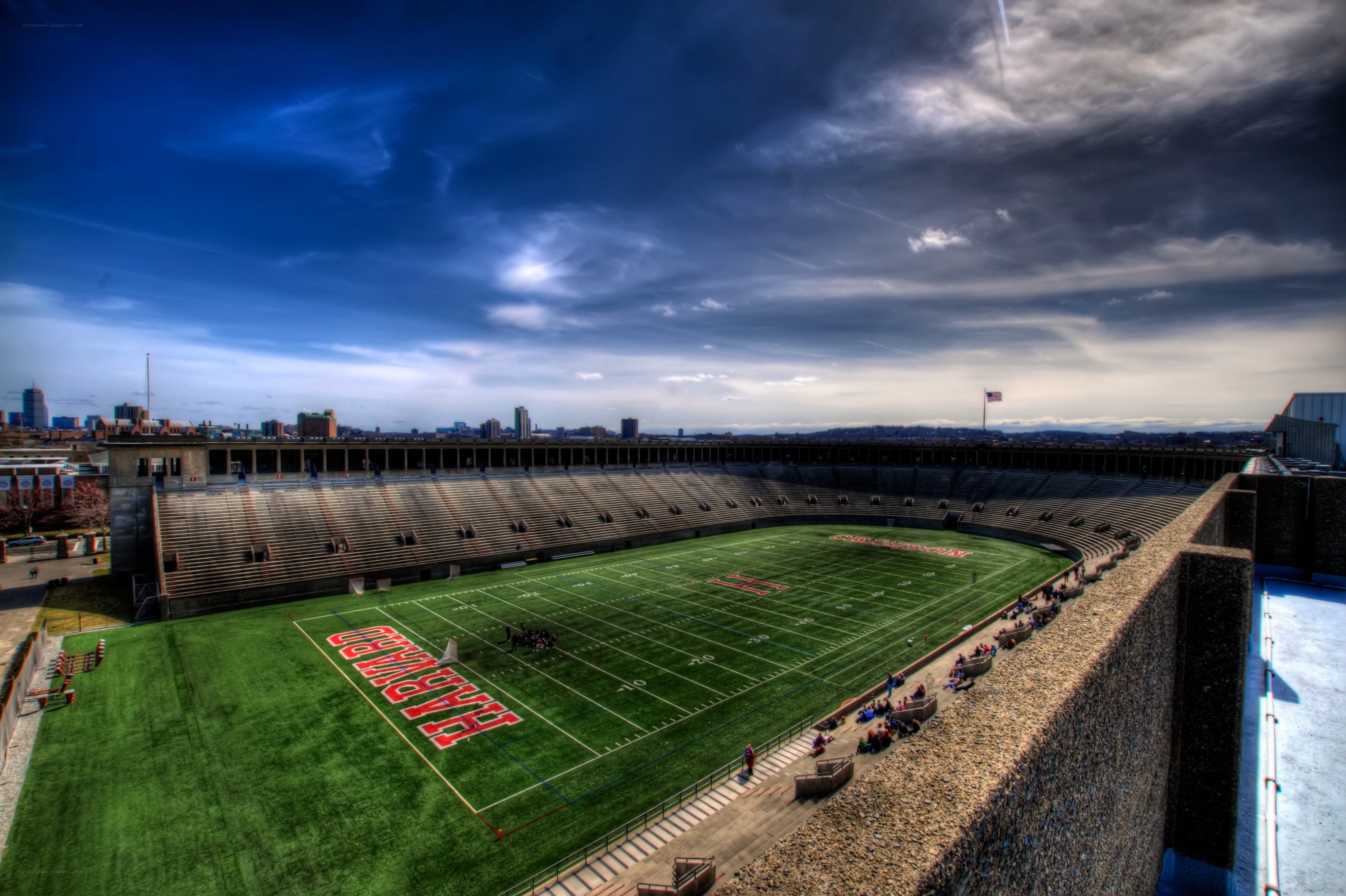 Harvard Stadium with city skyline
