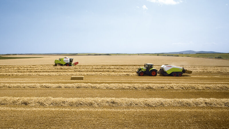 Harvesting Machinery in Field