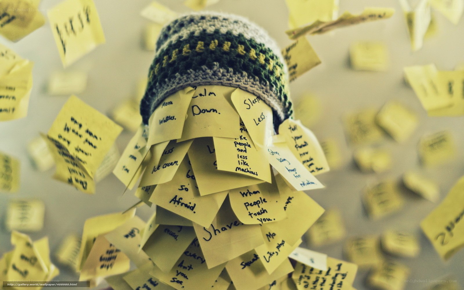 hat covered in notes