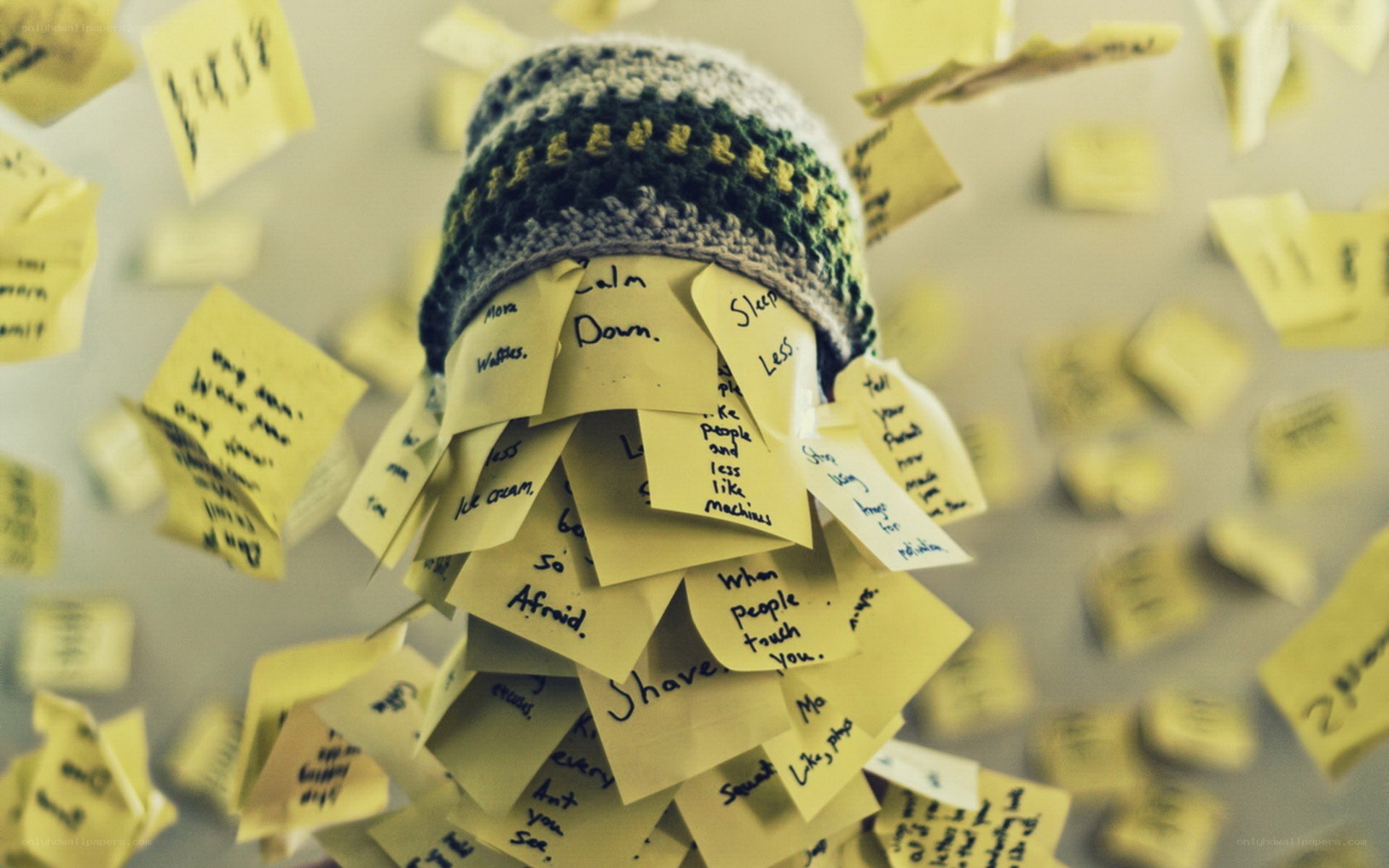 hat covered in sticky notes