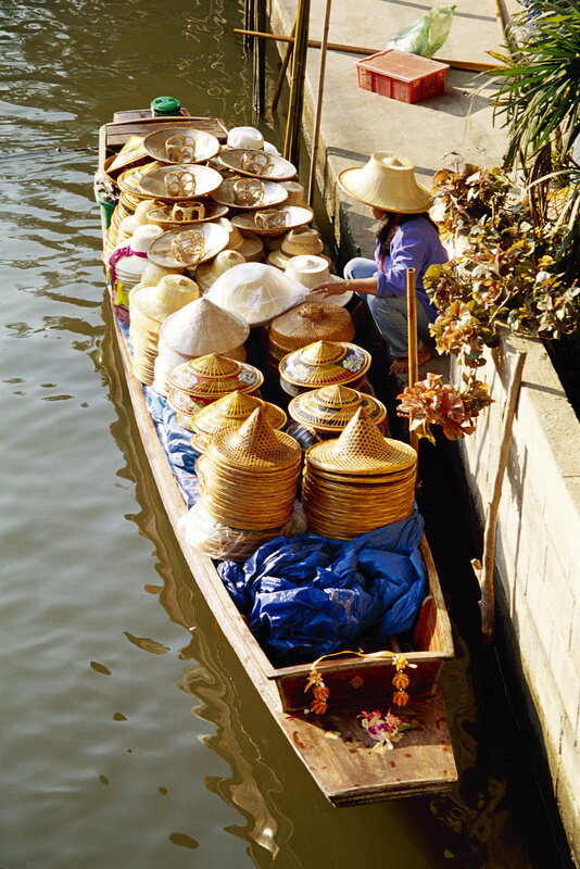 Hat vendor on a canal boat