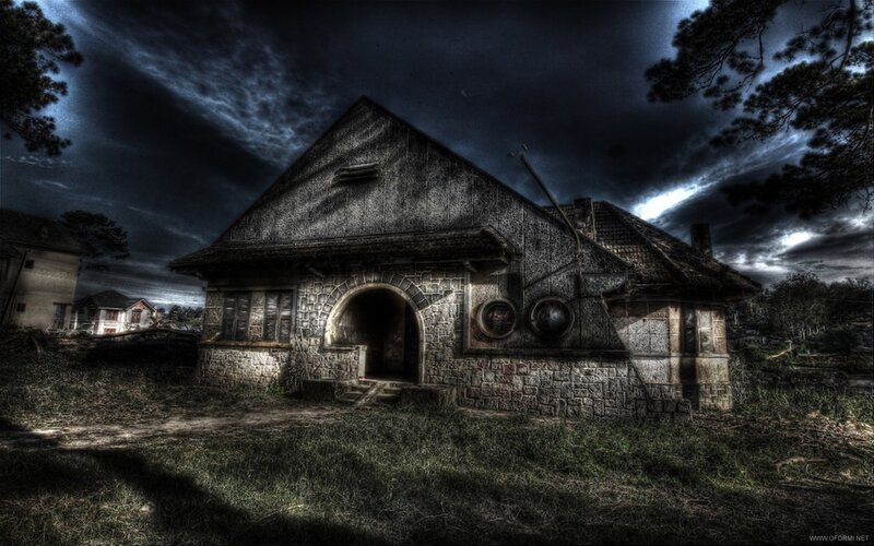 haunted house under stormy sky