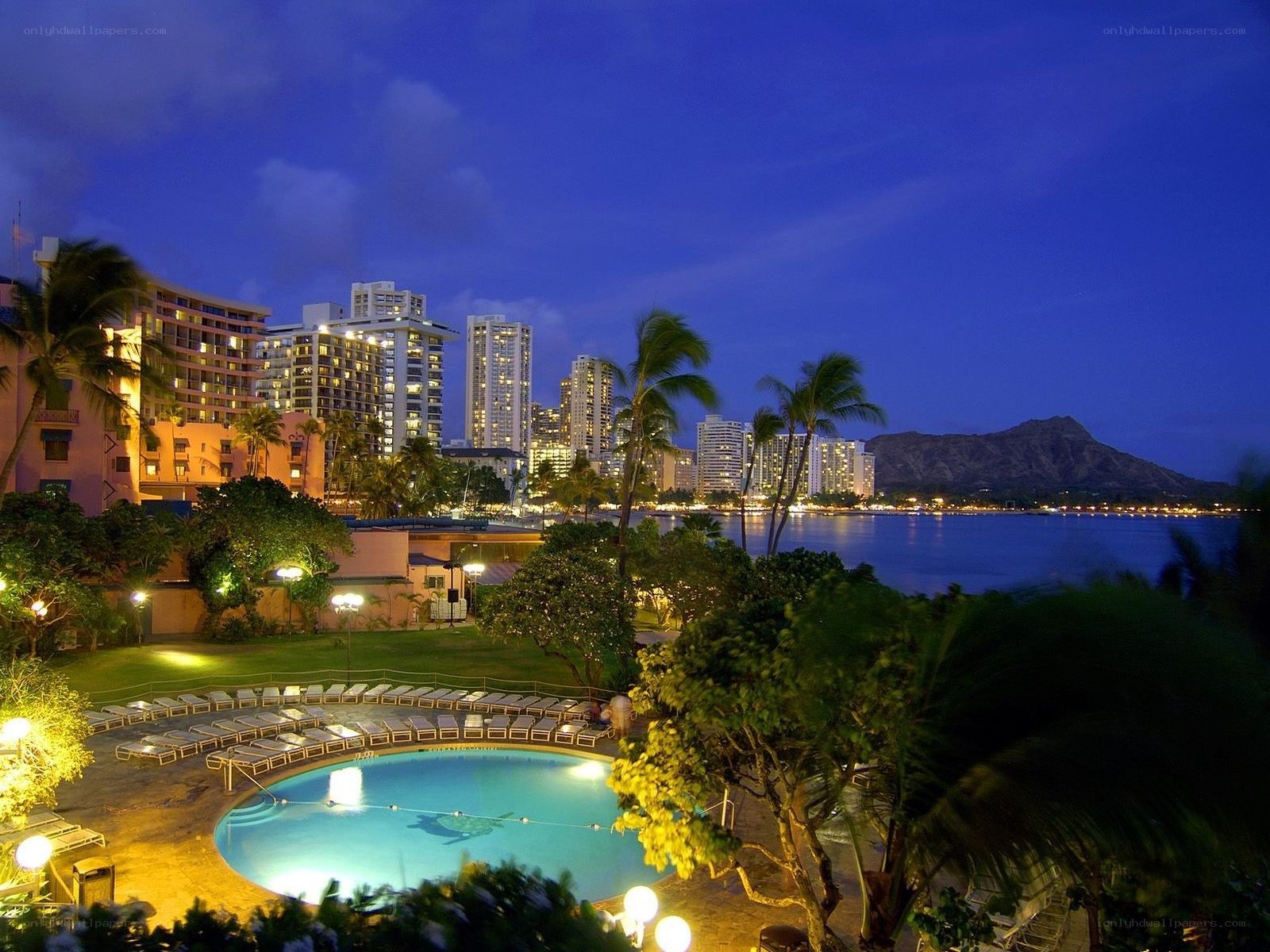 Hawaii hotel pool at dusk