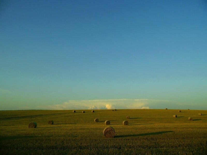 Hay Bales in Field — Blue, Serene, Sunset, Photograph, Sky, Clouds