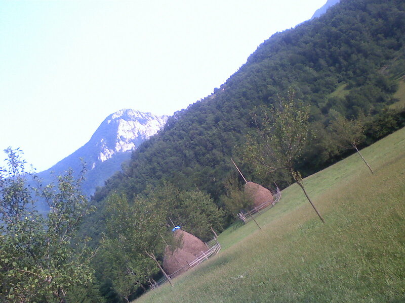 Haystacks in Mountain Valley
