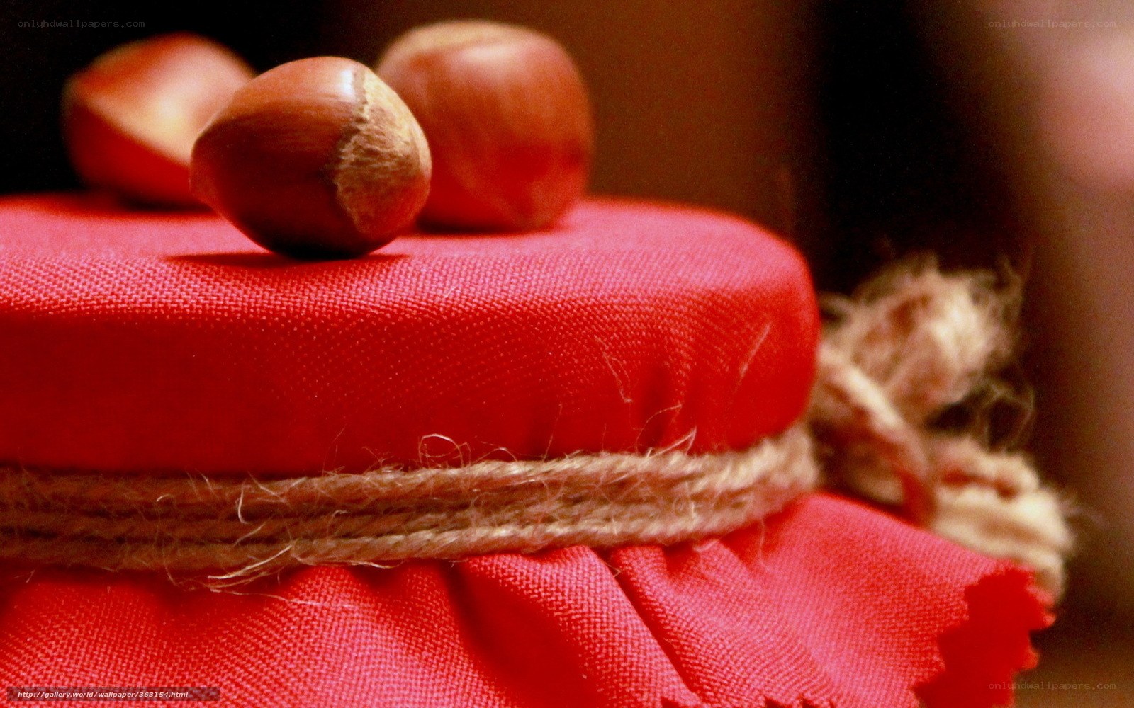 Hazelnuts on red fabric