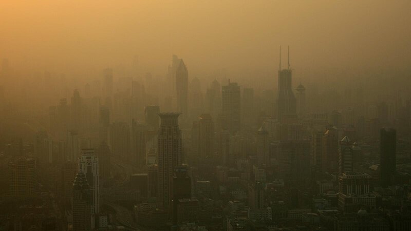 hazy city skyline at dusk
