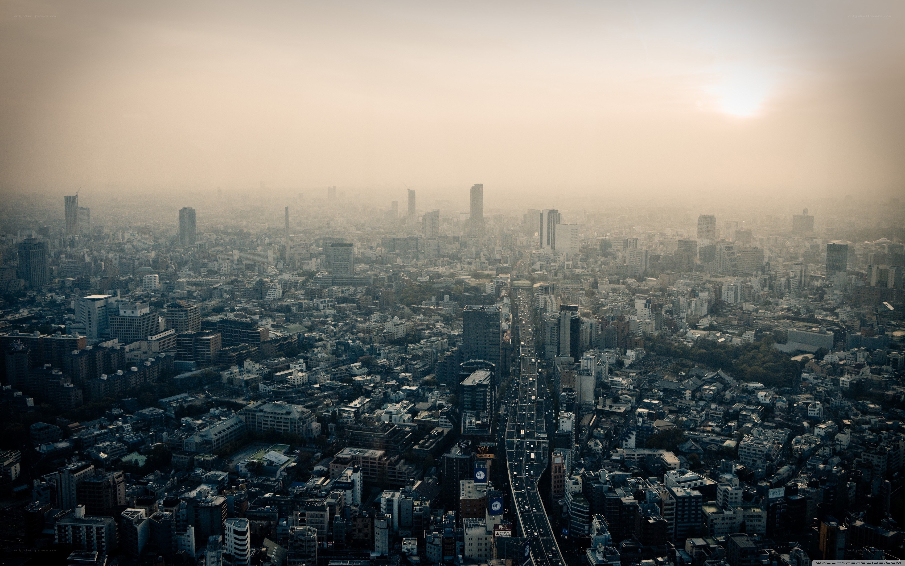 hazy cityscape at sunrise