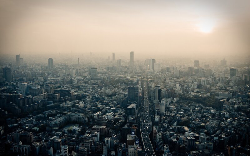 Hazy cityscape at sunrise