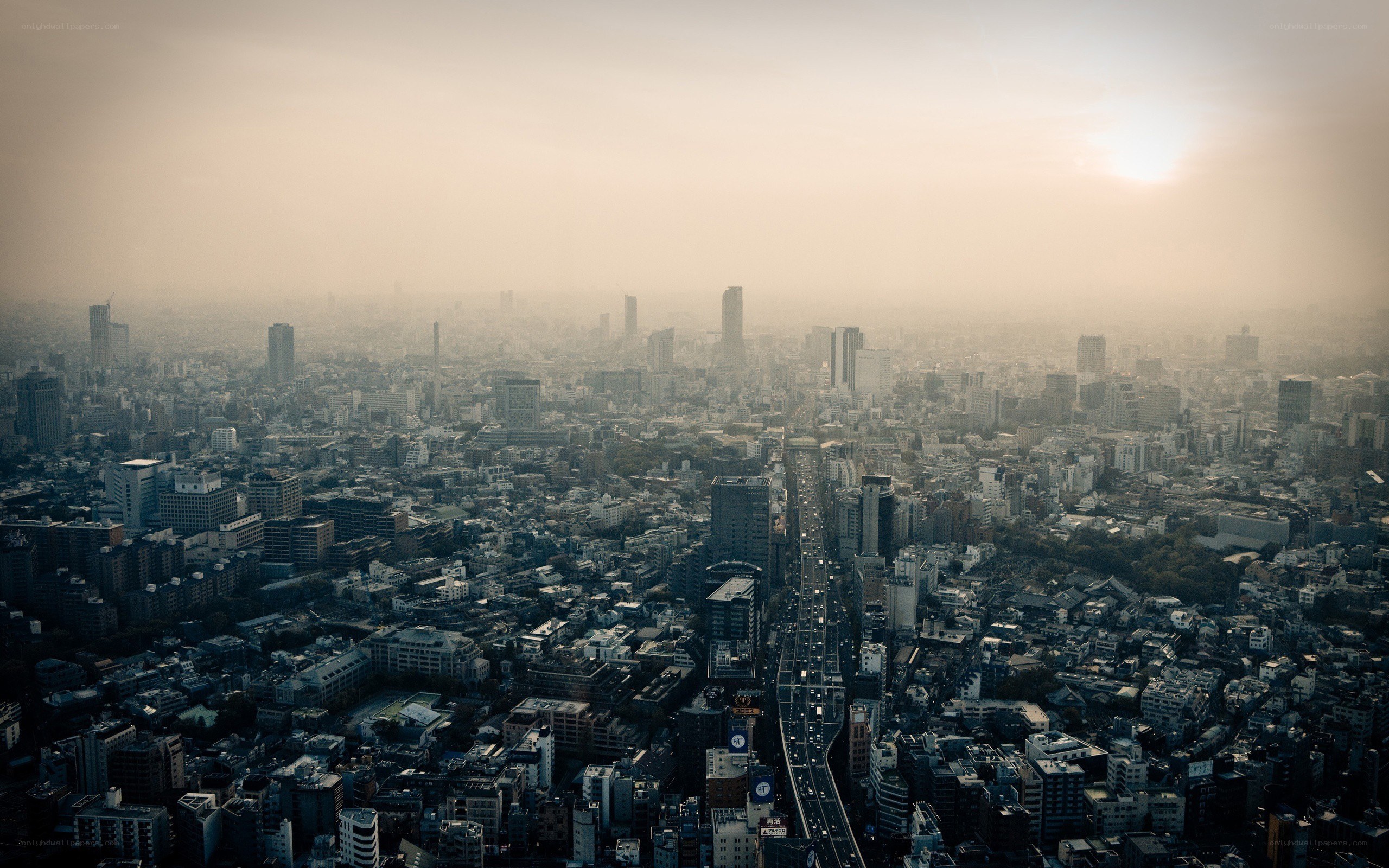 Hazy cityscape at sunrise