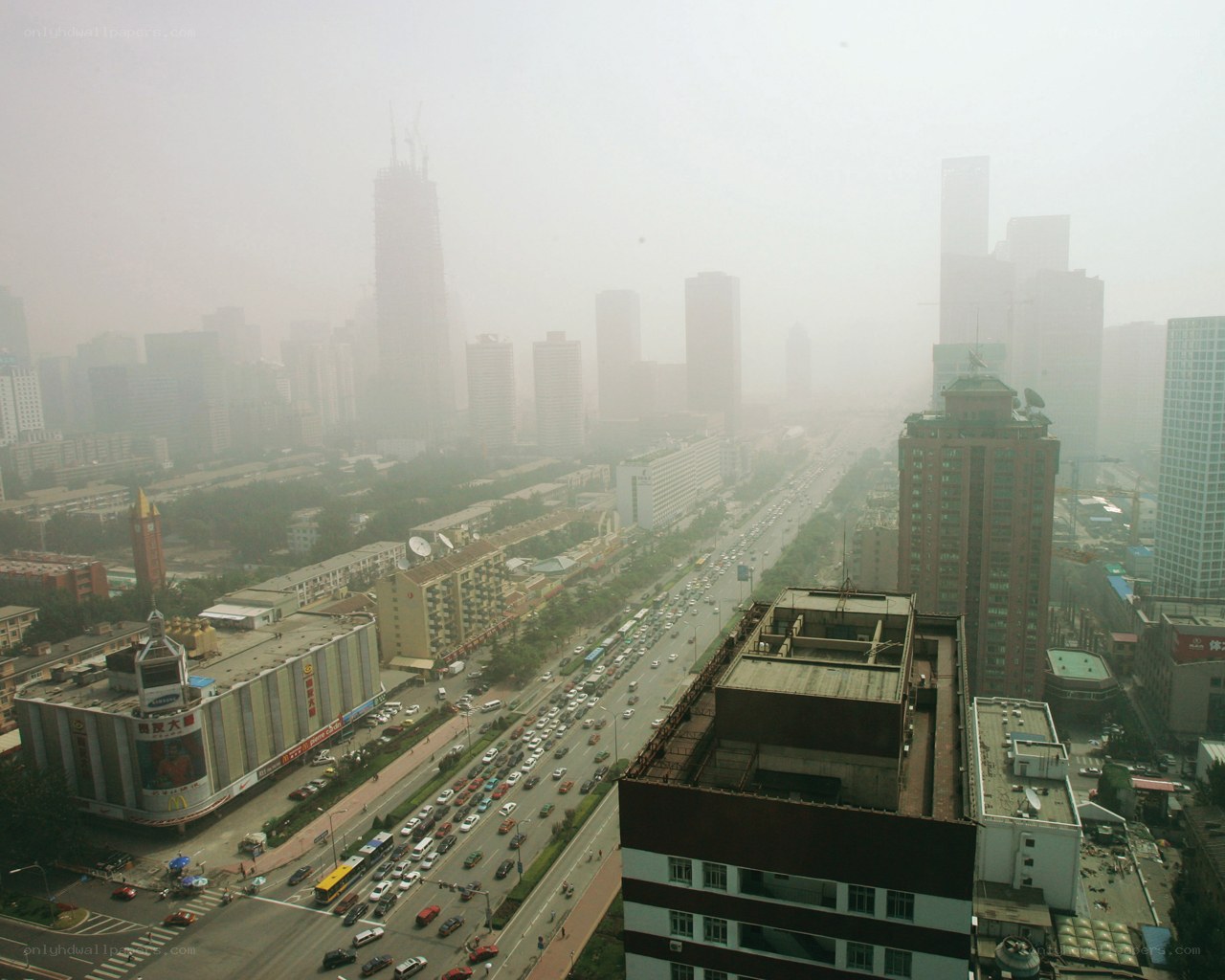 hazy cityscape with traffic