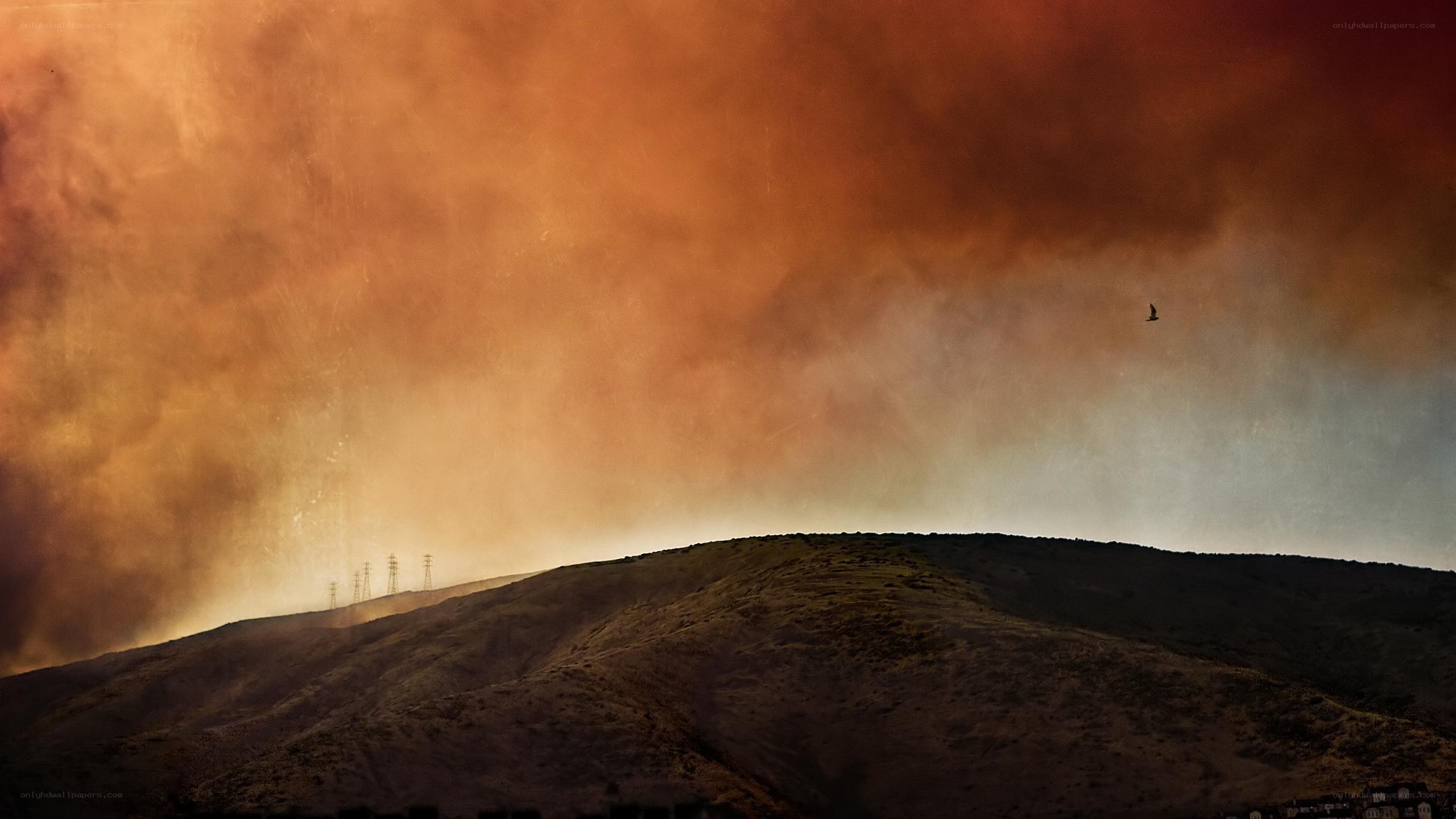 Hazy sky over a hill