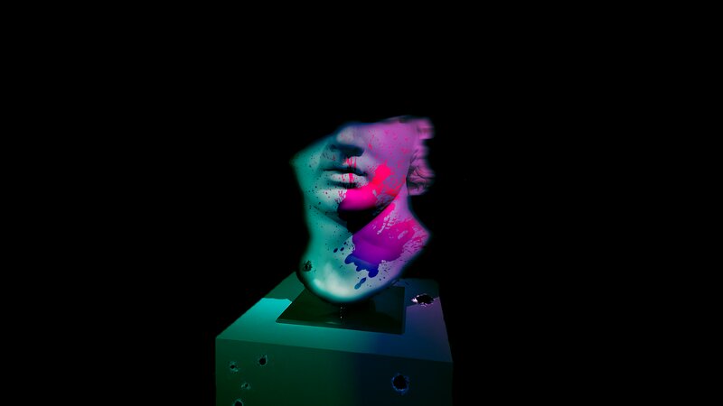 Head Sculpture on Pedestal
