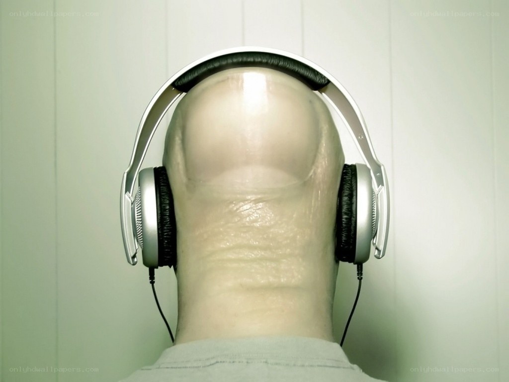 headphone-wearing man from behind