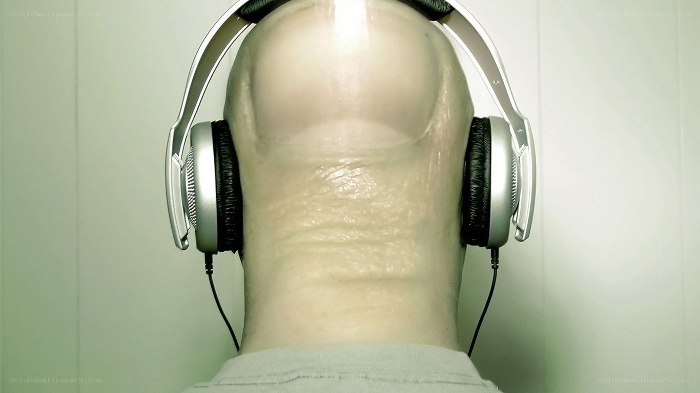 headphone-wearing man from behind