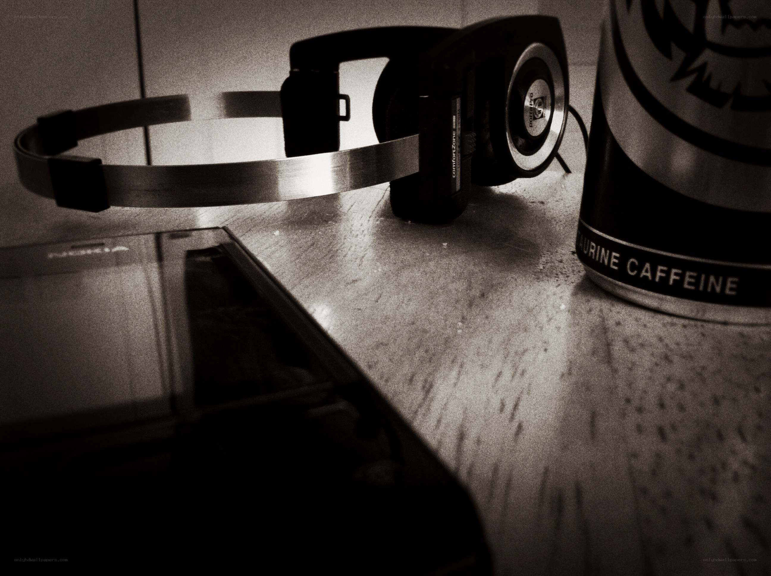 headphones and energy drink