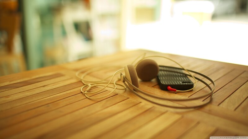 headphones and phone on table