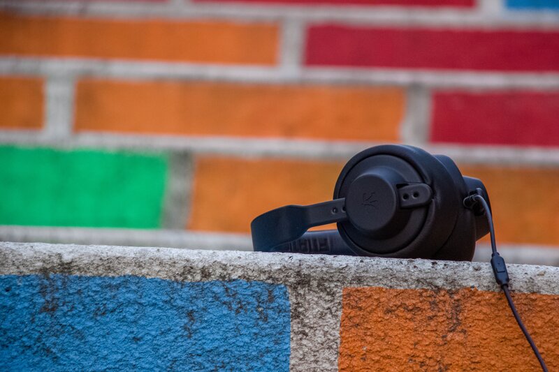 headphones on a colorful wall